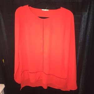 Bright red blouse